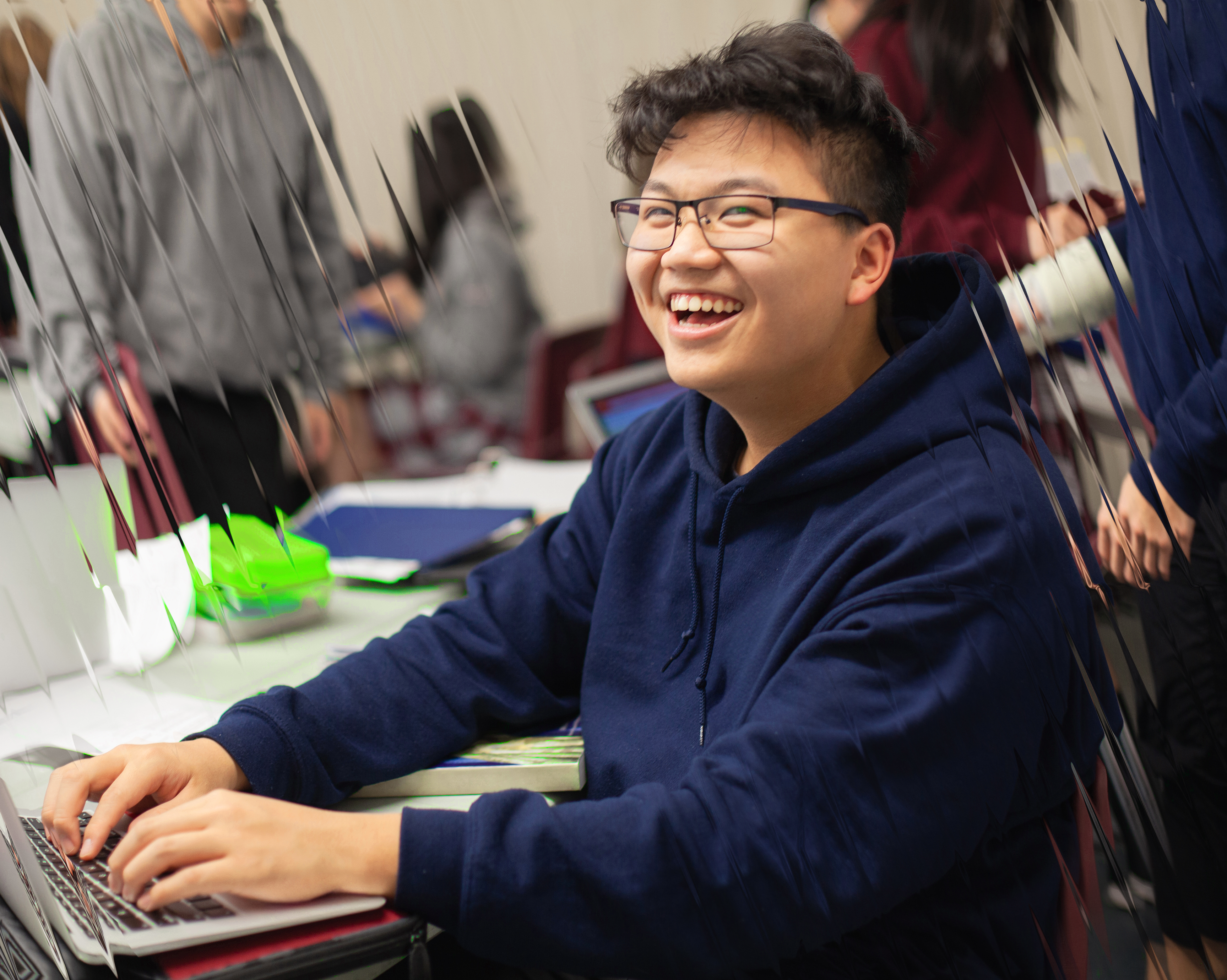 Laughing student looking at camera